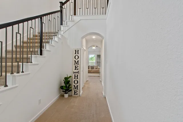 wooden floor with staircase