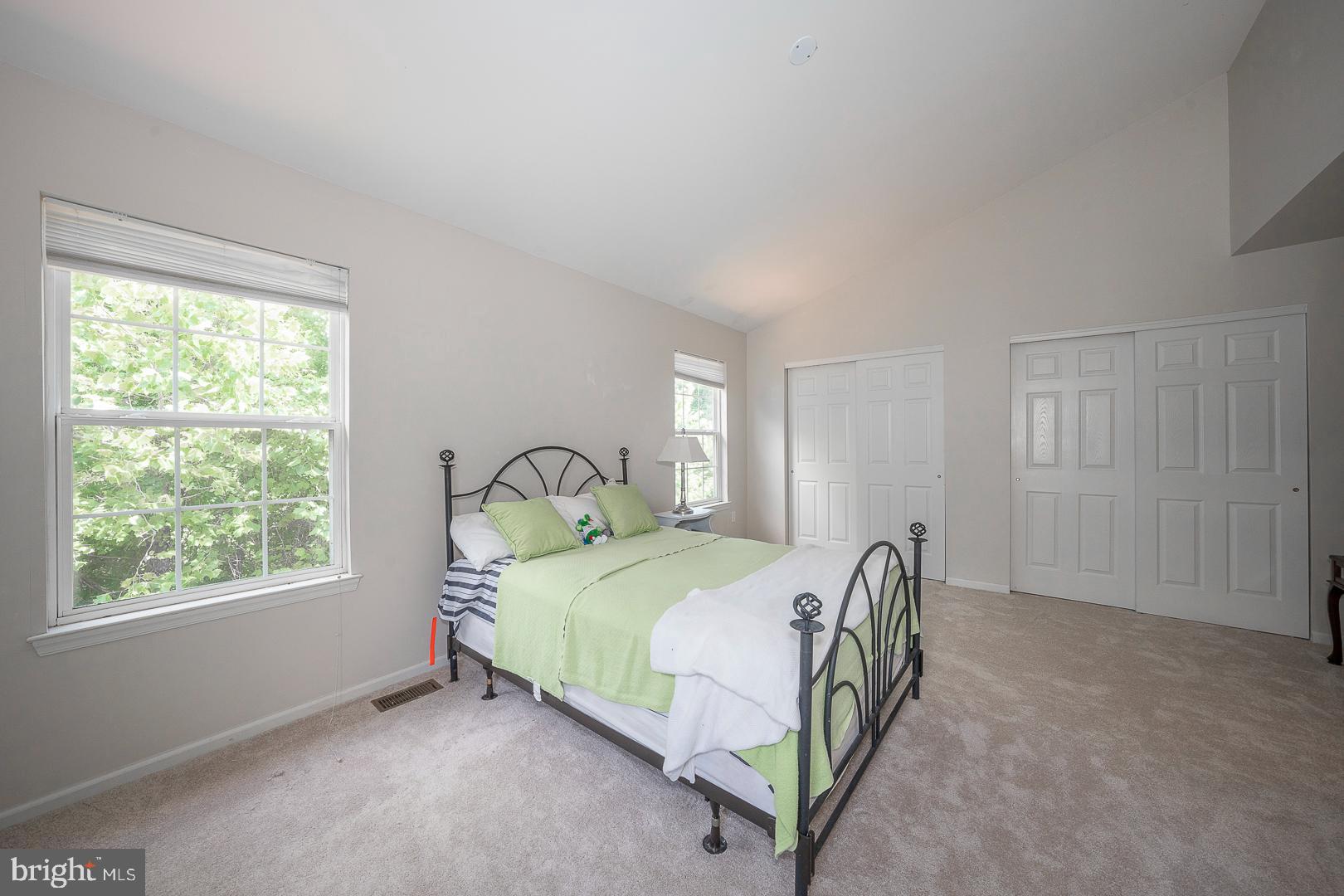 240 Springvalley Way Aston, PA 19014 - Photo 15 of 29 a bedroom with a bed and a window