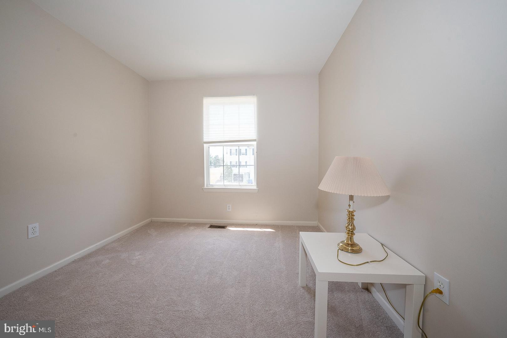 240 Springvalley Way Aston, PA 19014 - Photo 17 of 29 a room with a window and a table