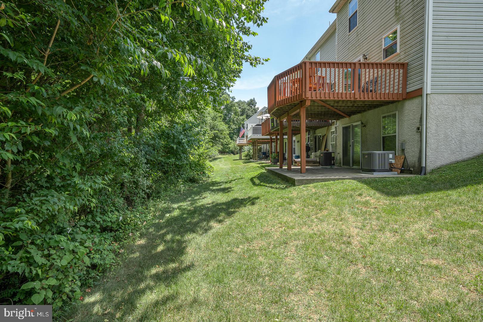 240 Springvalley Way Aston, PA 19014 - Photo 28 of 29 a view of a chairs and table in the yard