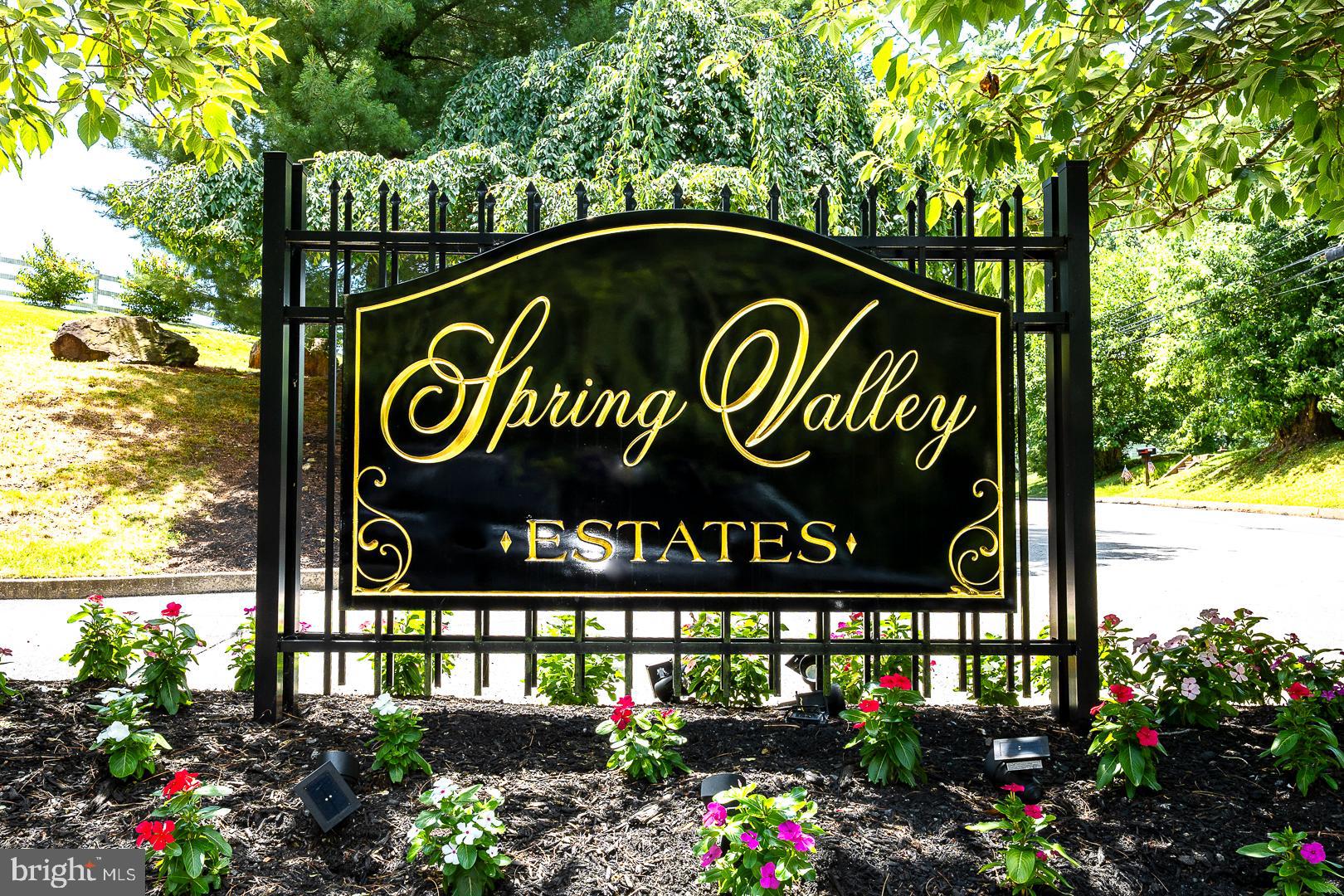 240 Springvalley Way Aston, PA 19014 - Photo 4 of 29 a street sign that is on a pole