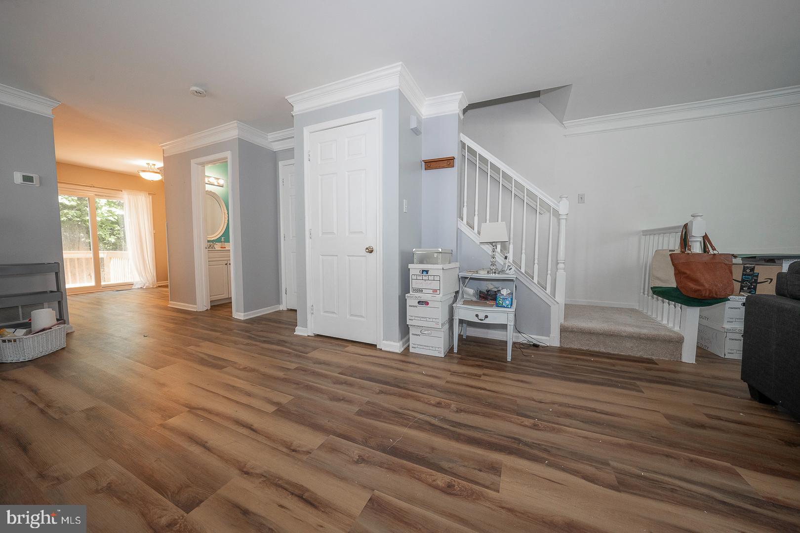 240 Springvalley Way Aston, PA 19014 - Photo 7 of 29 a view of livingroom with furniture and wooden floor