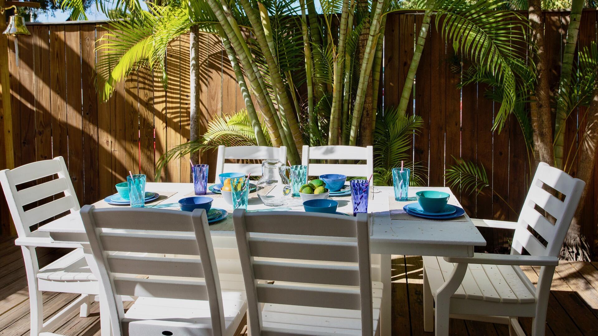 4 Aronovitz Lane Key West, FL 33040 - Photo 14 of 36 a view of dinning table and chairs in patio