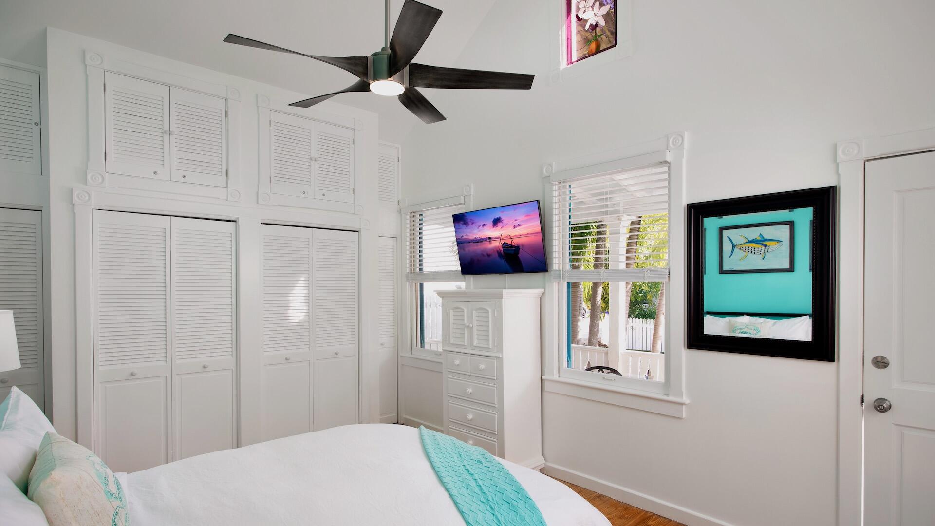 4 Aronovitz Lane Key West, FL 33040 - Photo 22 of 36 a bedroom with a bed and a flat screen tv