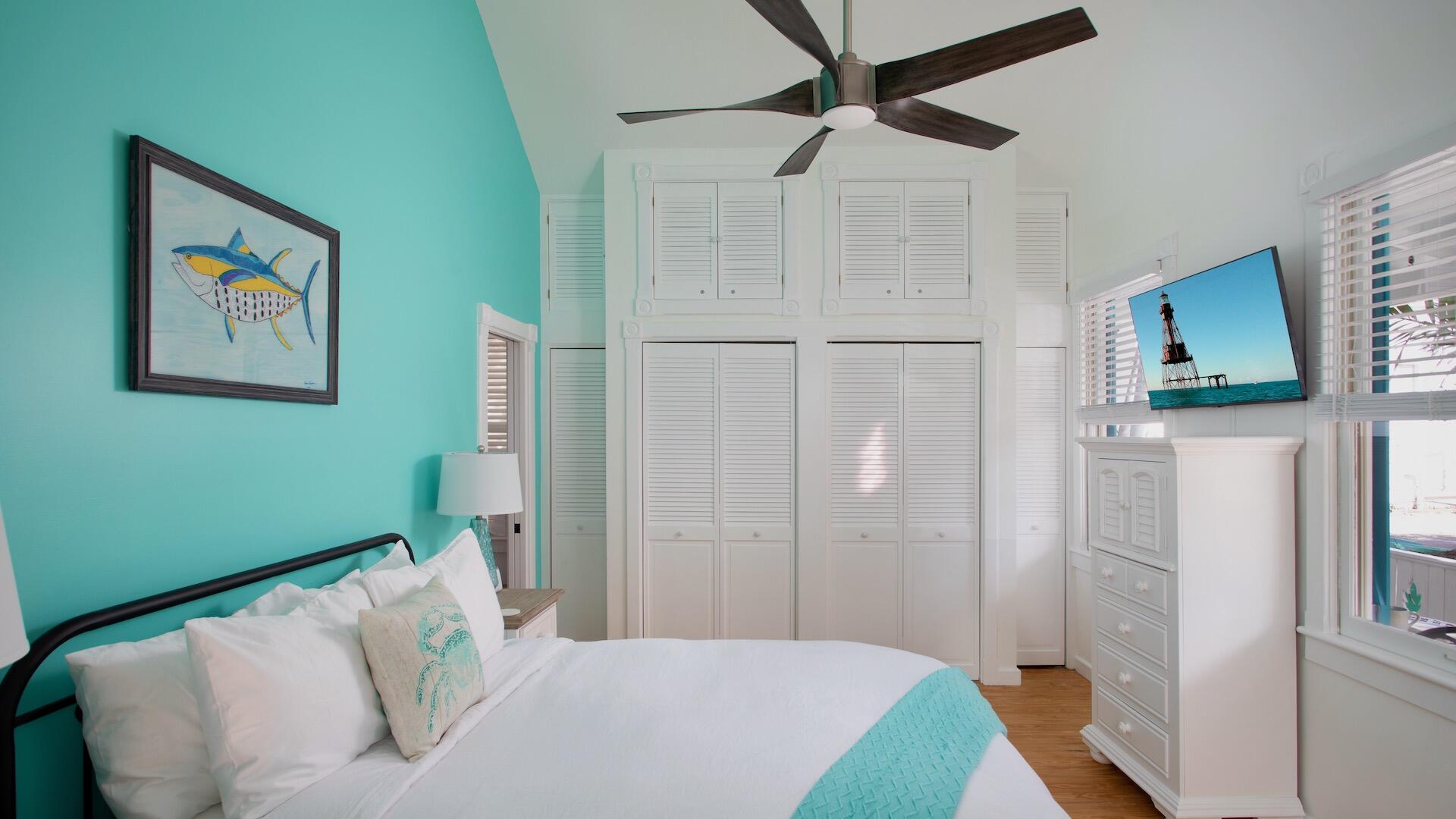 4 Aronovitz Lane Key West, FL 33040 - Photo 23 of 36 a bedroom with a bed and a television