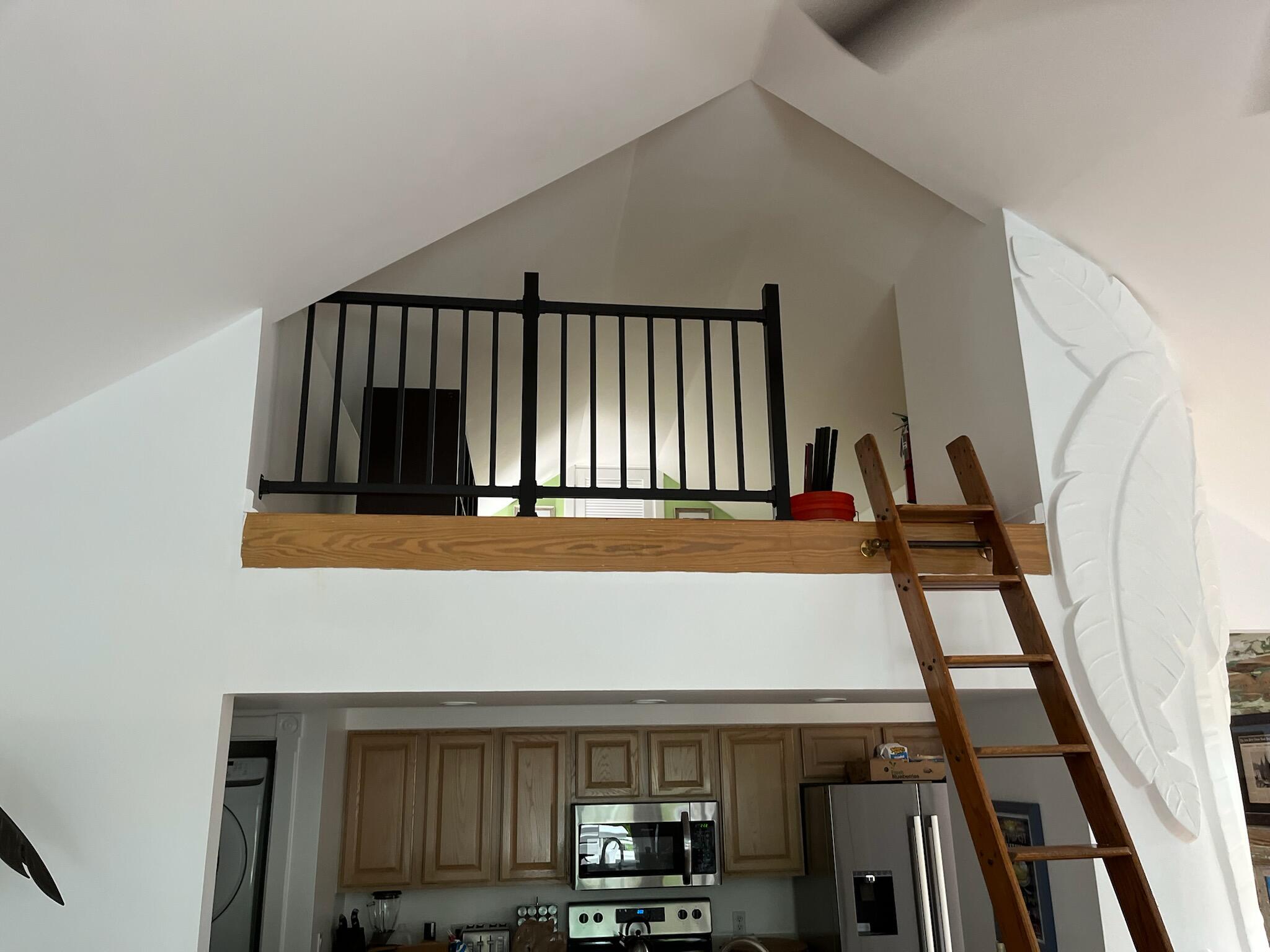 4 Aronovitz Lane Key West, FL 33040 - Photo 29 of 36 a view of staircase with black and white walls
