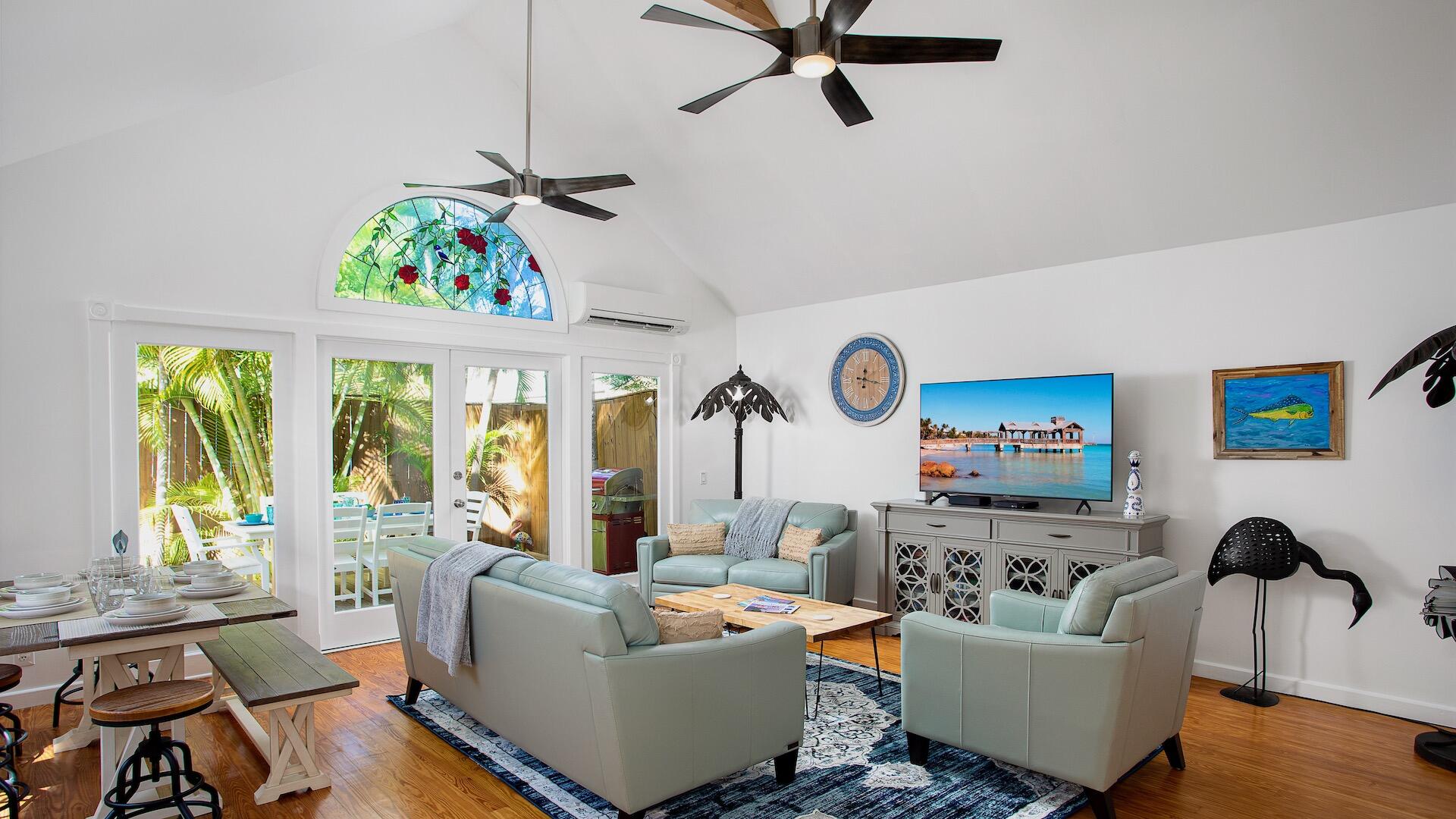 4 Aronovitz Lane Key West, FL 33040 - Photo 3 of 36 a living room with furniture and a large window