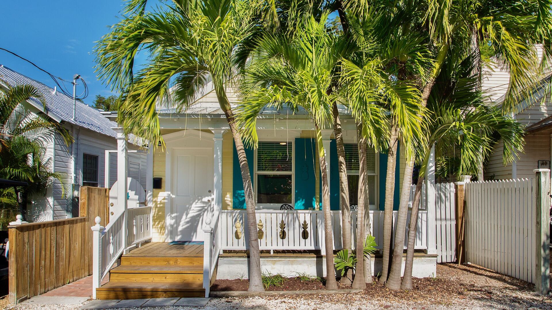 4 Aronovitz Lane Key West, FL 33040 - Photo 36 of 36 a front view of a house with a garden
