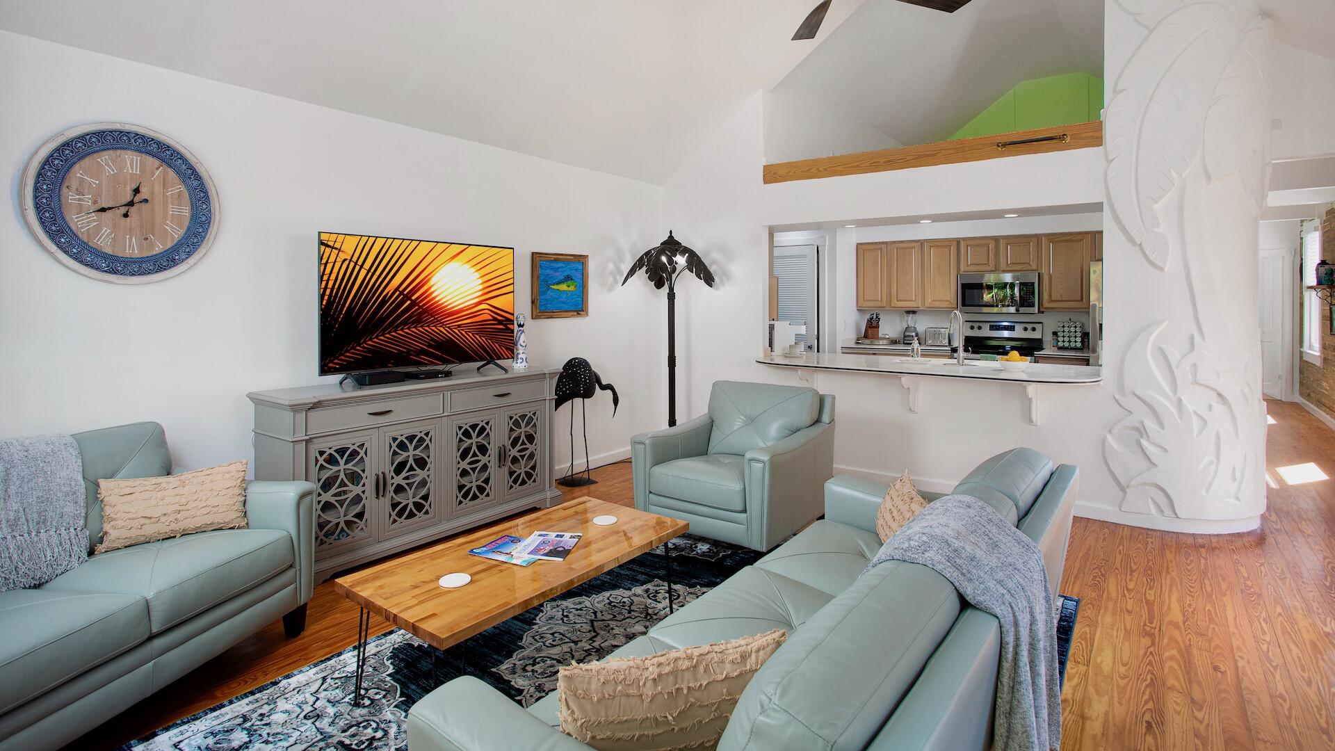 4 Aronovitz Lane Key West, FL 33040 - Photo 5 of 36 a living room with furniture and a flat screen tv