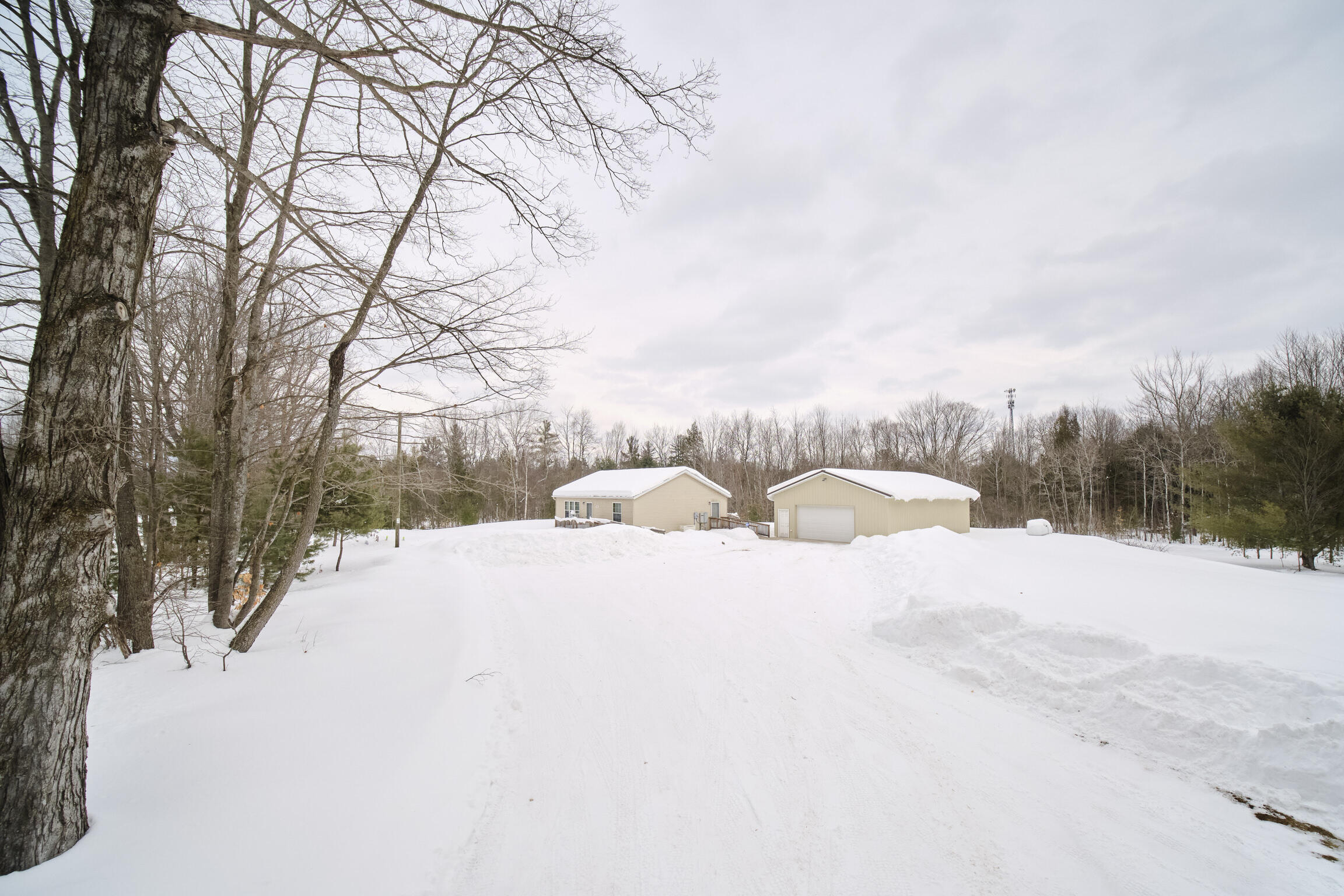 15837 Erwin Road Copemish, MI 49625 - Photo 42 of 54 Blacktop driveway under snow!