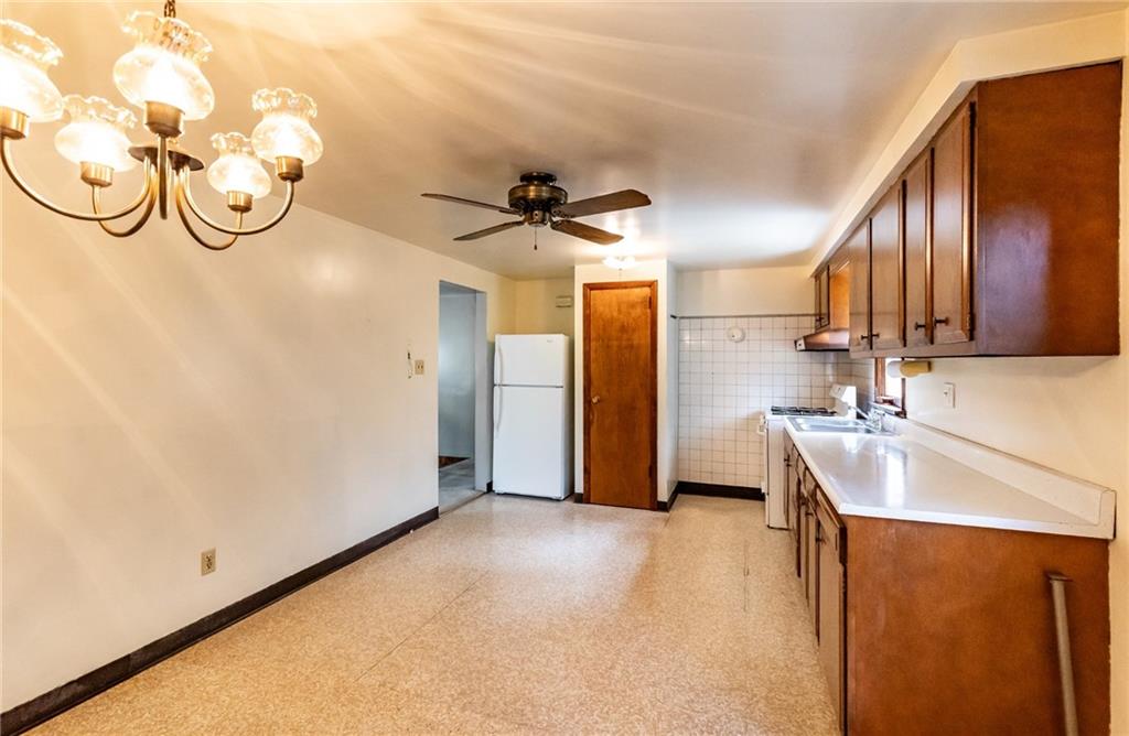 535 Neely Street Baden, PA 15005 - Photo 14 of 42 a view of a kitchen with a sink