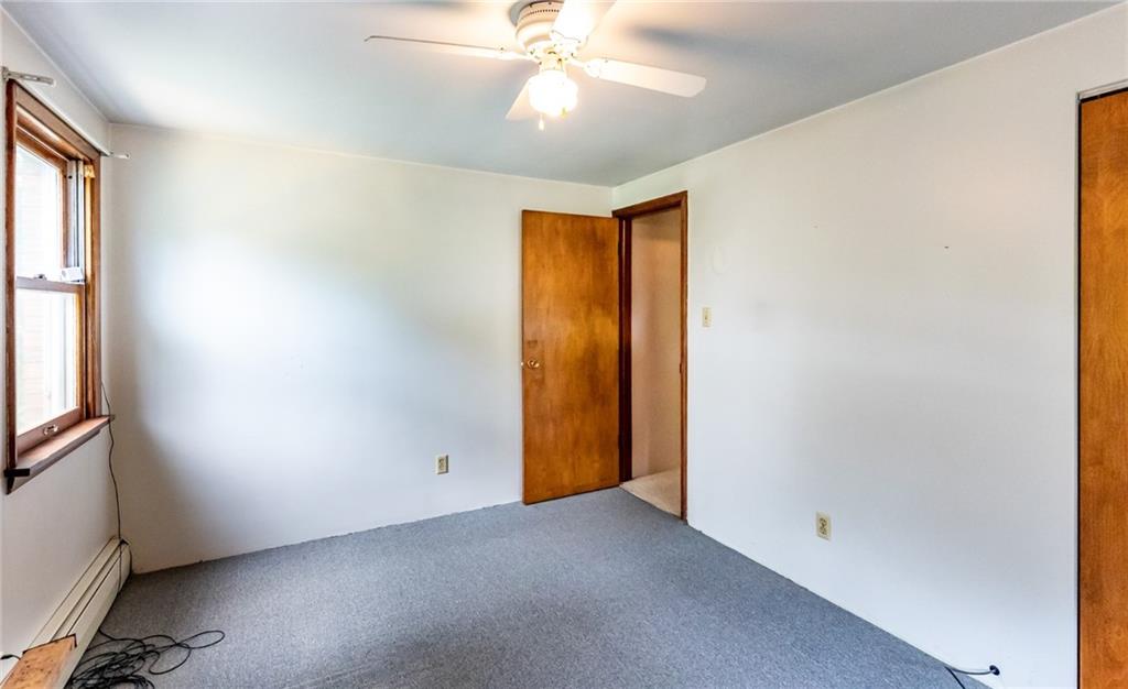 535 Neely Street Baden, PA 15005 - Photo 15 of 42 an empty room with windows and closet