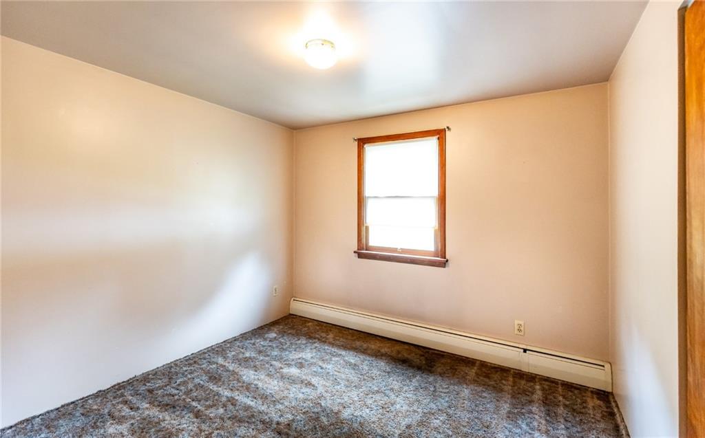 535 Neely Street Baden, PA 15005 - Photo 16 of 42 an empty room with a window