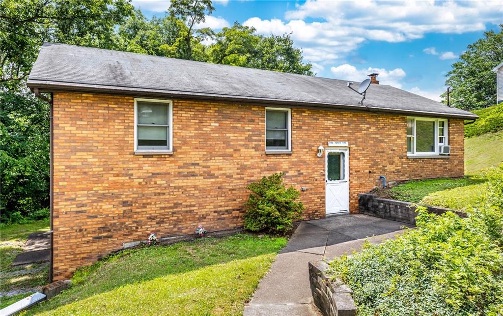 535 Neely Street Baden, PA 15005 - Photo 2 of 42 a front view of a house with a yard