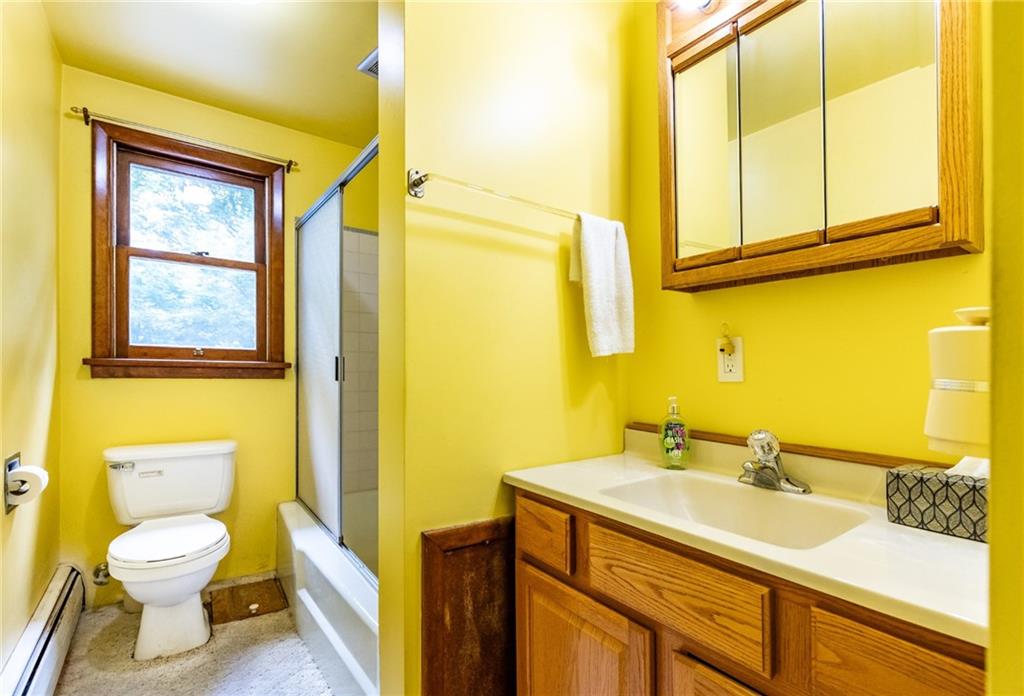 535 Neely Street Baden, PA 15005 - Photo 23 of 42 a bathroom with a granite countertop sink toilet and shower