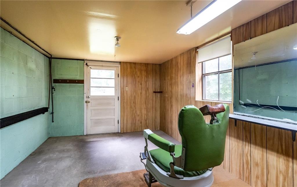 535 Neely Street Baden, PA 15005 - Photo 33 of 42 a living room with furniture and a large window