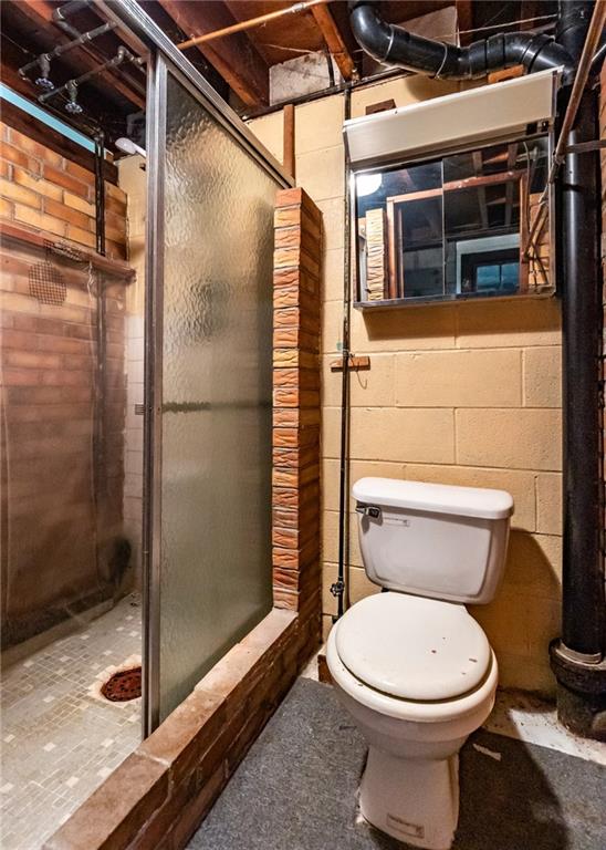 535 Neely Street Baden, PA 15005 - Photo 34 of 42 a bathroom with a toilet and a shower