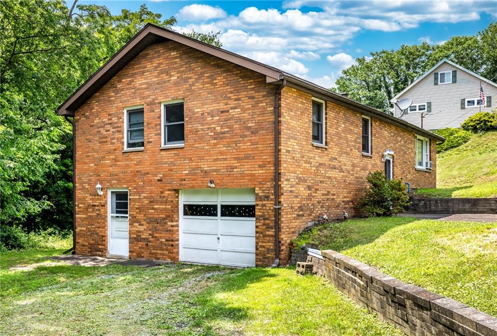 535 Neely Street Baden, PA 15005 - Photo 37 of 42 a view of a house with a yard