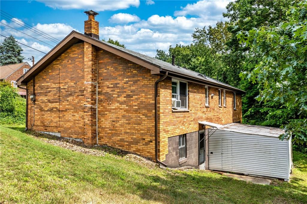 535 Neely Street Baden, PA 15005 - Photo 38 of 42 a view of a house with a yard