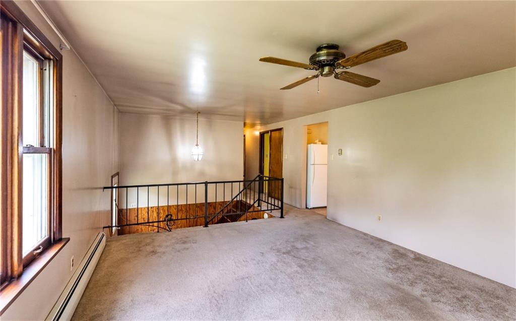 535 Neely Street Baden, PA 15005 - Photo 5 of 42 a view of a hallway with a ceiling fan