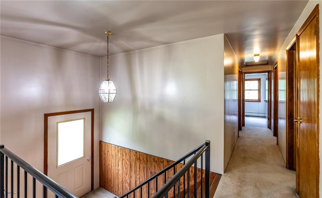 535 Neely Street Baden, PA 15005 - Photo 7 of 42 a view of a hallway with wooden floor and entryway