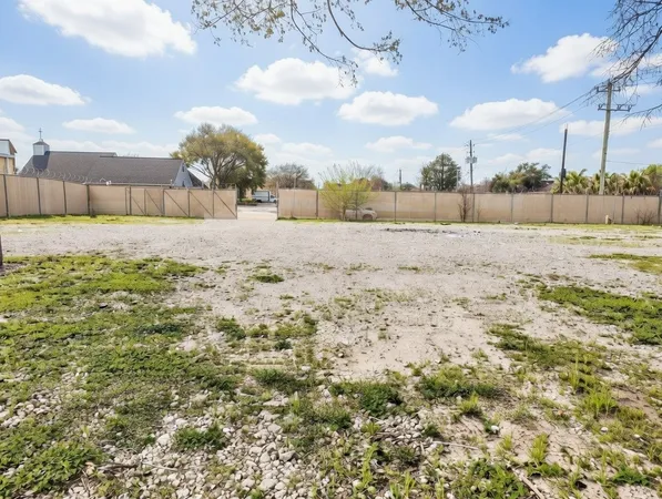 a view of beach and yard