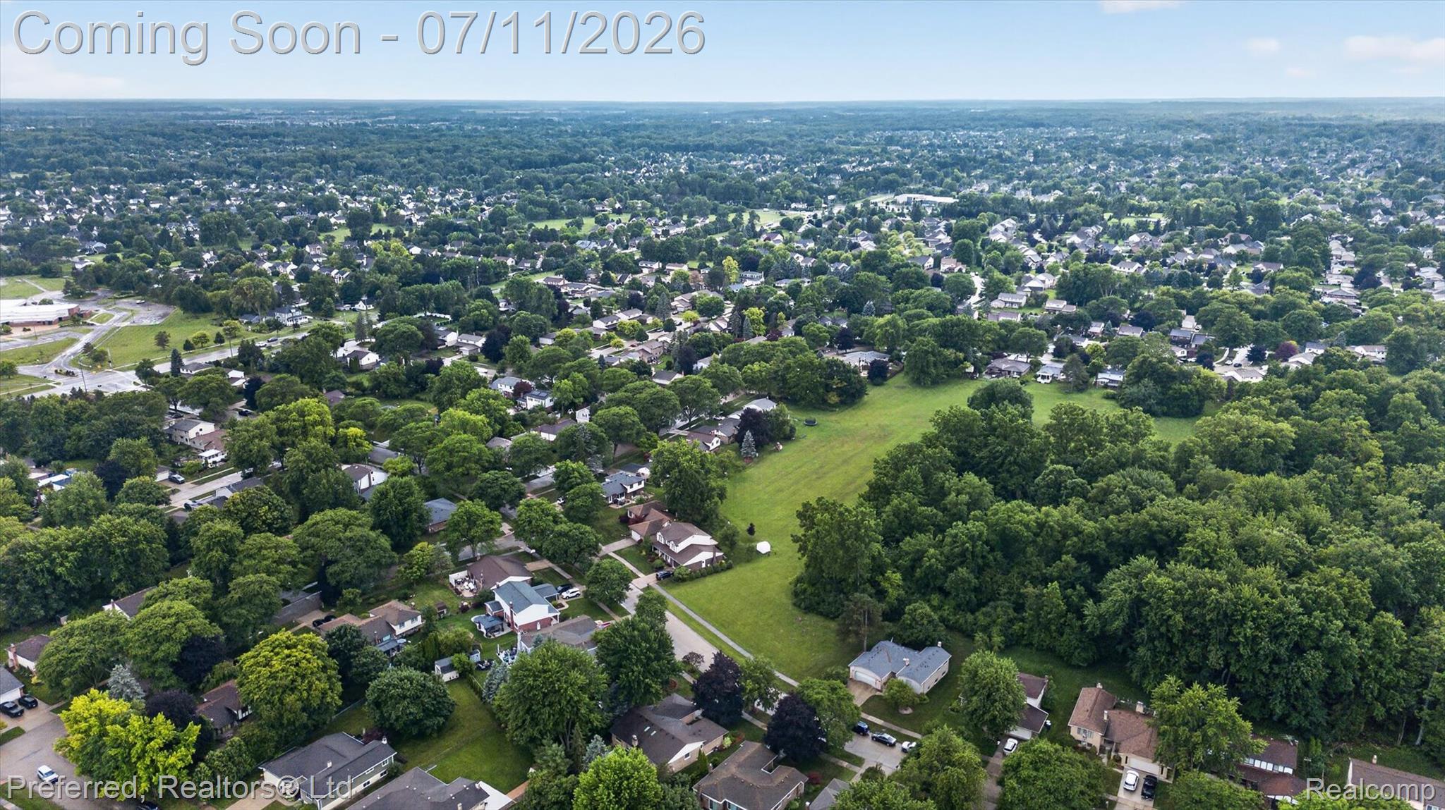 46596 Maidstone Road Canton, MI 48187 - Photo 60 of 61 Expansive aerial perspective showcasing a mature residential area with abundant green space