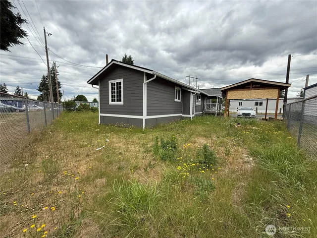 a house view with a garden space