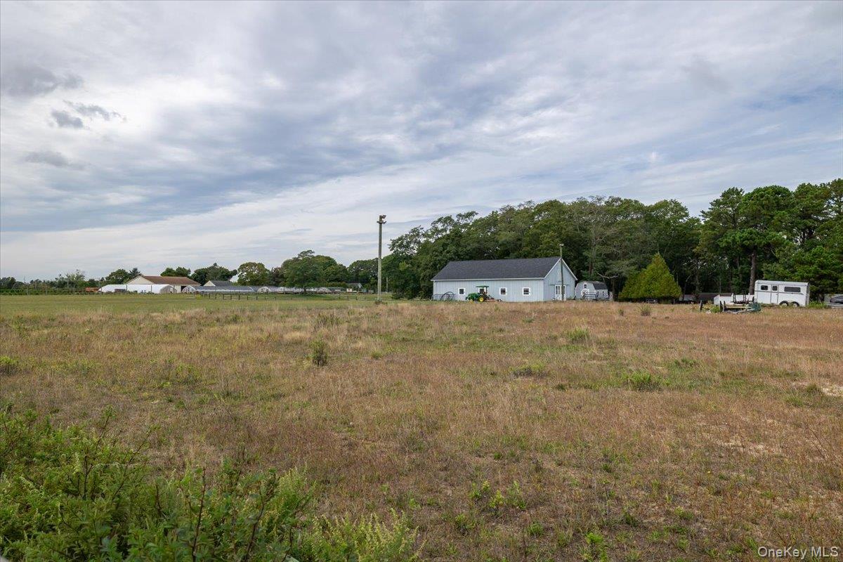 1535 Middle Road Calverton, NY 11933 - Photo 6 of 16 a view of a lake with houses