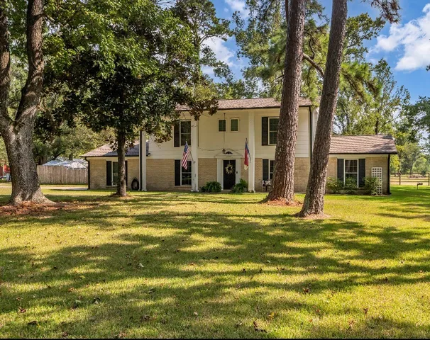 a view of a house with a swimming pool