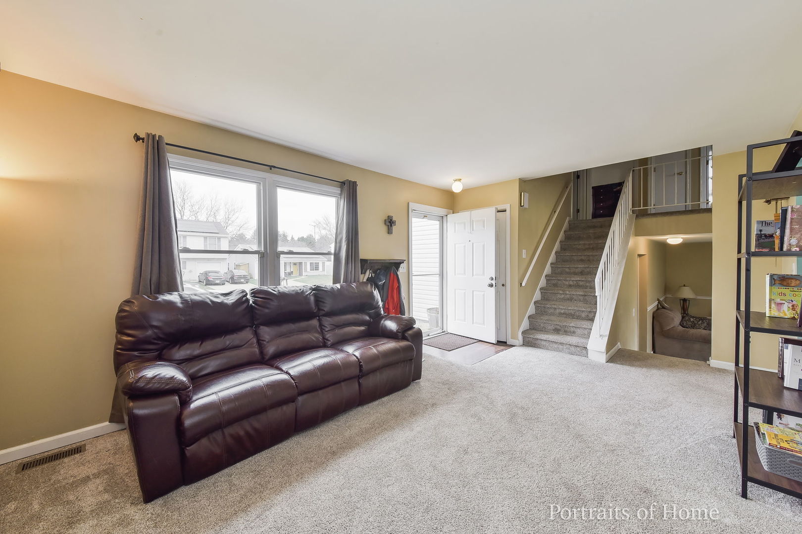 1870 Brighton Circle Aurora, IL 60506 - Photo 2 of 16 a living room with furniture and a window
