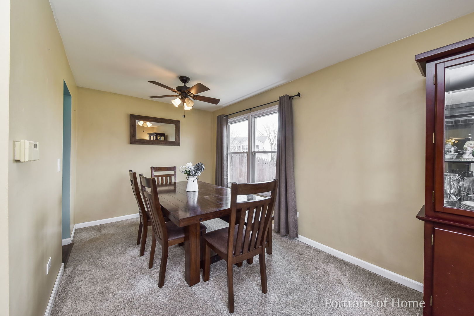 1870 Brighton Circle Aurora, IL 60506 - Photo 4 of 16 a view of a dining room with furniture and a chandelier