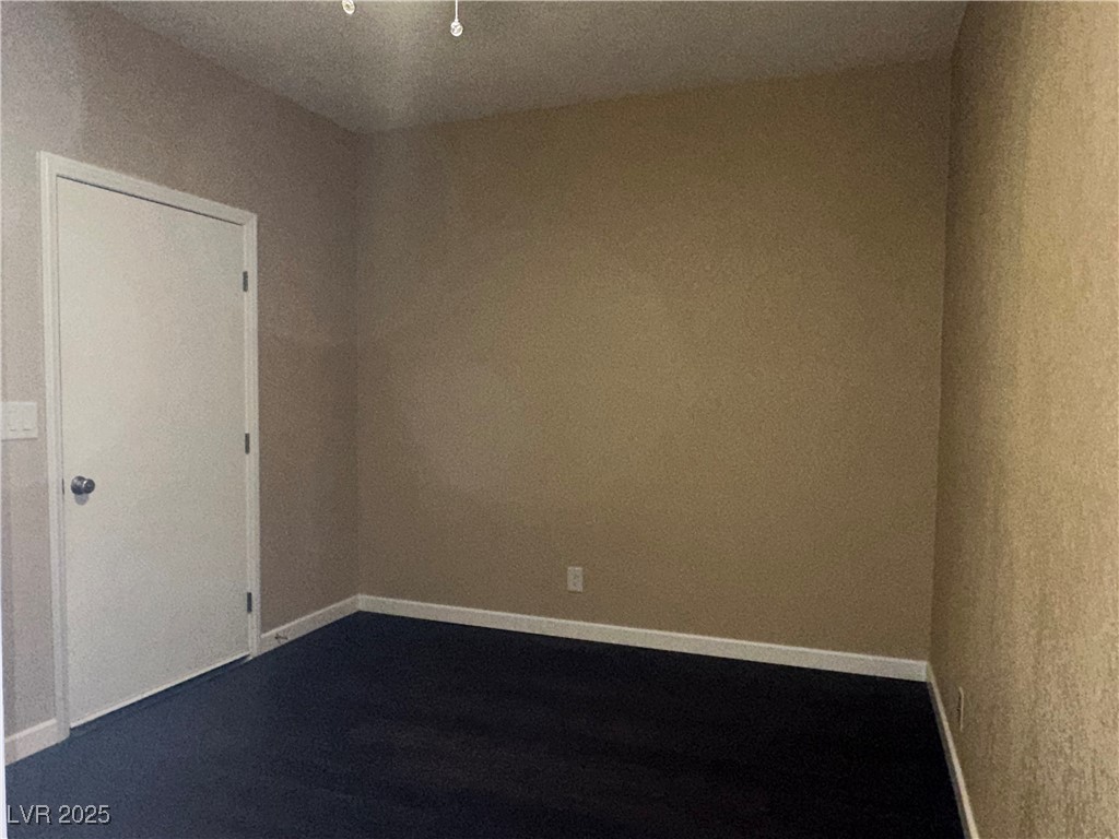 305 Ridge Road Boulder City, NV 89005 - Photo 16 of 30 Spare room featuring baseboards