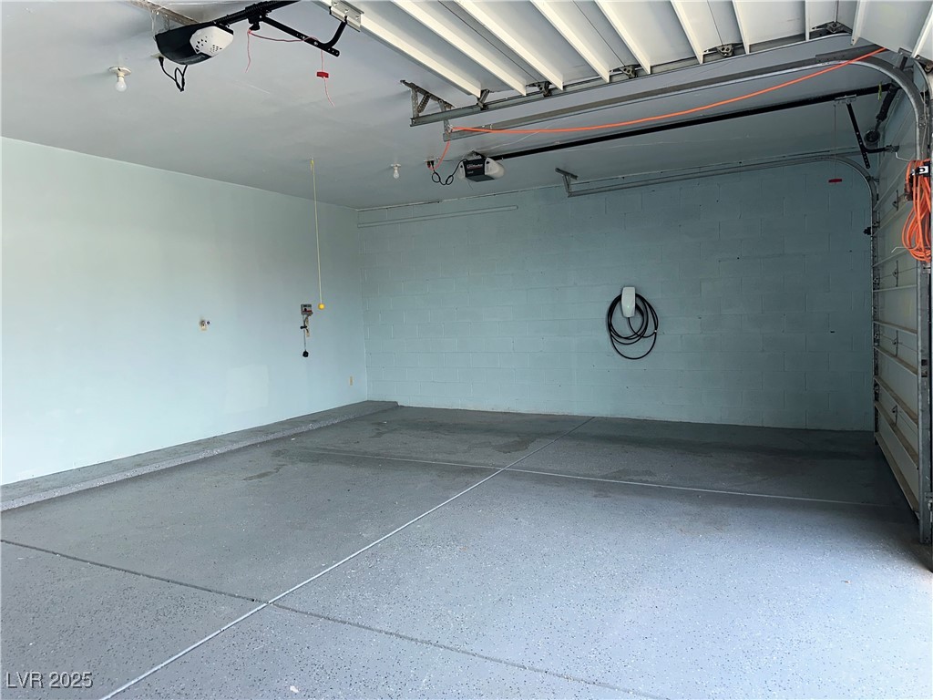 305 Ridge Road Boulder City, NV 89005 - Photo 30 of 30 Garage featuring a garage door opener n EV Charge