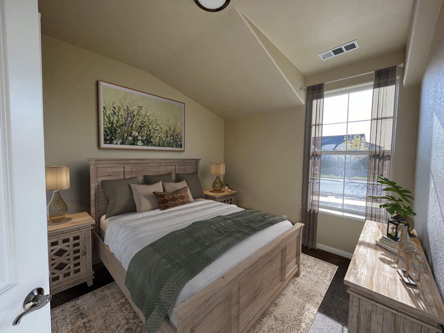 672 Bikle Drive King City, CA 93930 - Photo 12 of 39 a bedroom with a large bed and a window