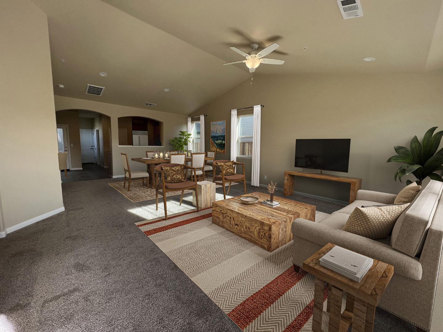 672 Bikle Drive King City, CA 93930 - Photo 4 of 39 a living room with furniture and a flat screen tv