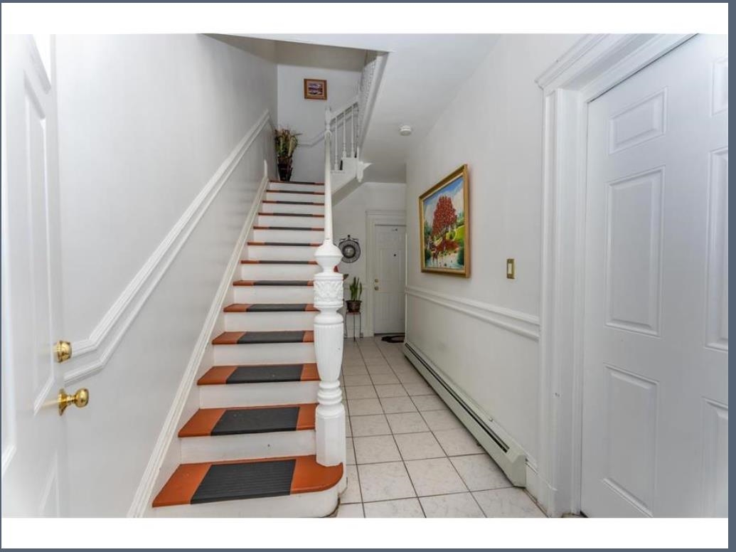 547 57th Street, Unit 2 West New York, NJ 07093 - Photo 5 of 8 a view of entryway and hall with wooden floor