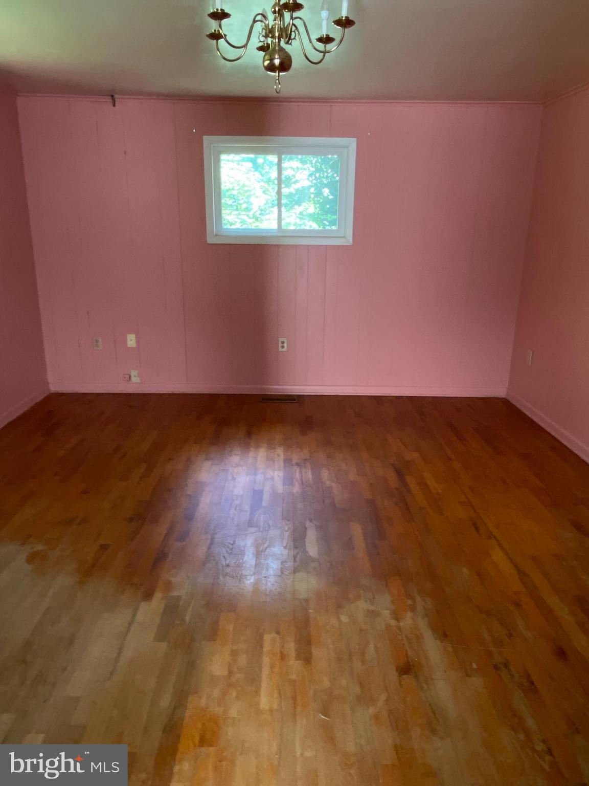 1 Sunset Drive Lavale, MD 21502 - Photo 19 of 21 an empty room with wooden floor and windows