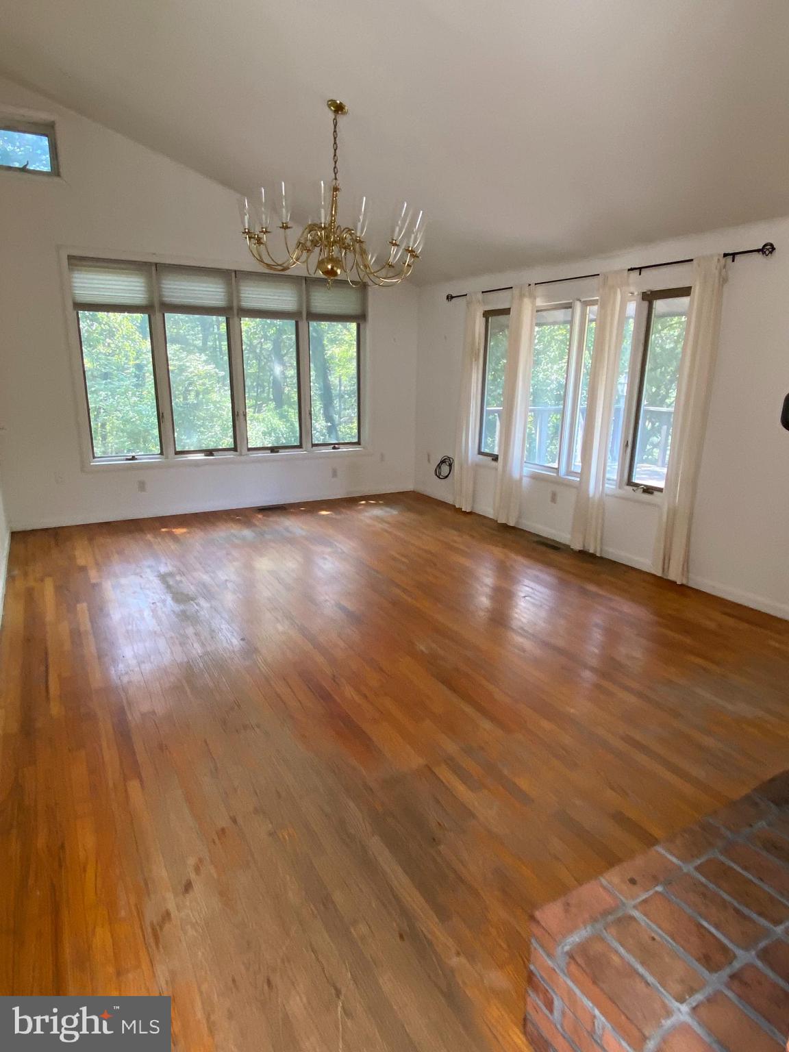 1 Sunset Drive Lavale, MD 21502 - Photo 9 of 21 an empty room with wooden floor and windows