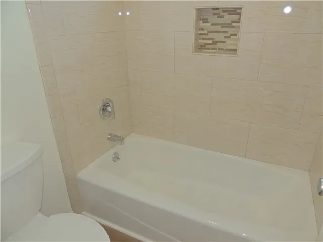 a bathroom with a bathtub
