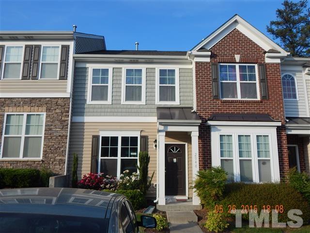 2948 Casona Way Raleigh, NC 27616 - Photo 1 of 11 front view of a brick house with a yard