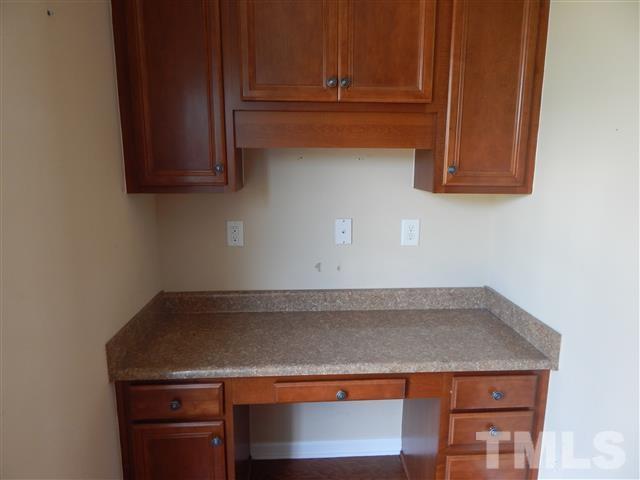 2948 Casona Way Raleigh, NC 27616 - Photo 3 of 11 a view of a kitchen with wooden floor