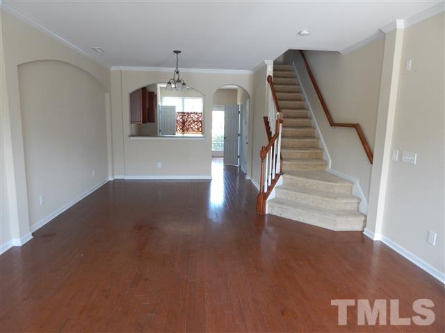 2948 Casona Way Raleigh, NC 27616 - Photo 4 of 11 a view of entryway and hall with wooden floor
