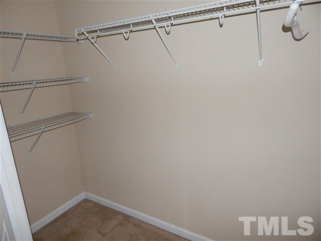 2948 Casona Way Raleigh, NC 27616 - Photo 10 of 11 a view of a room with racks on the wall