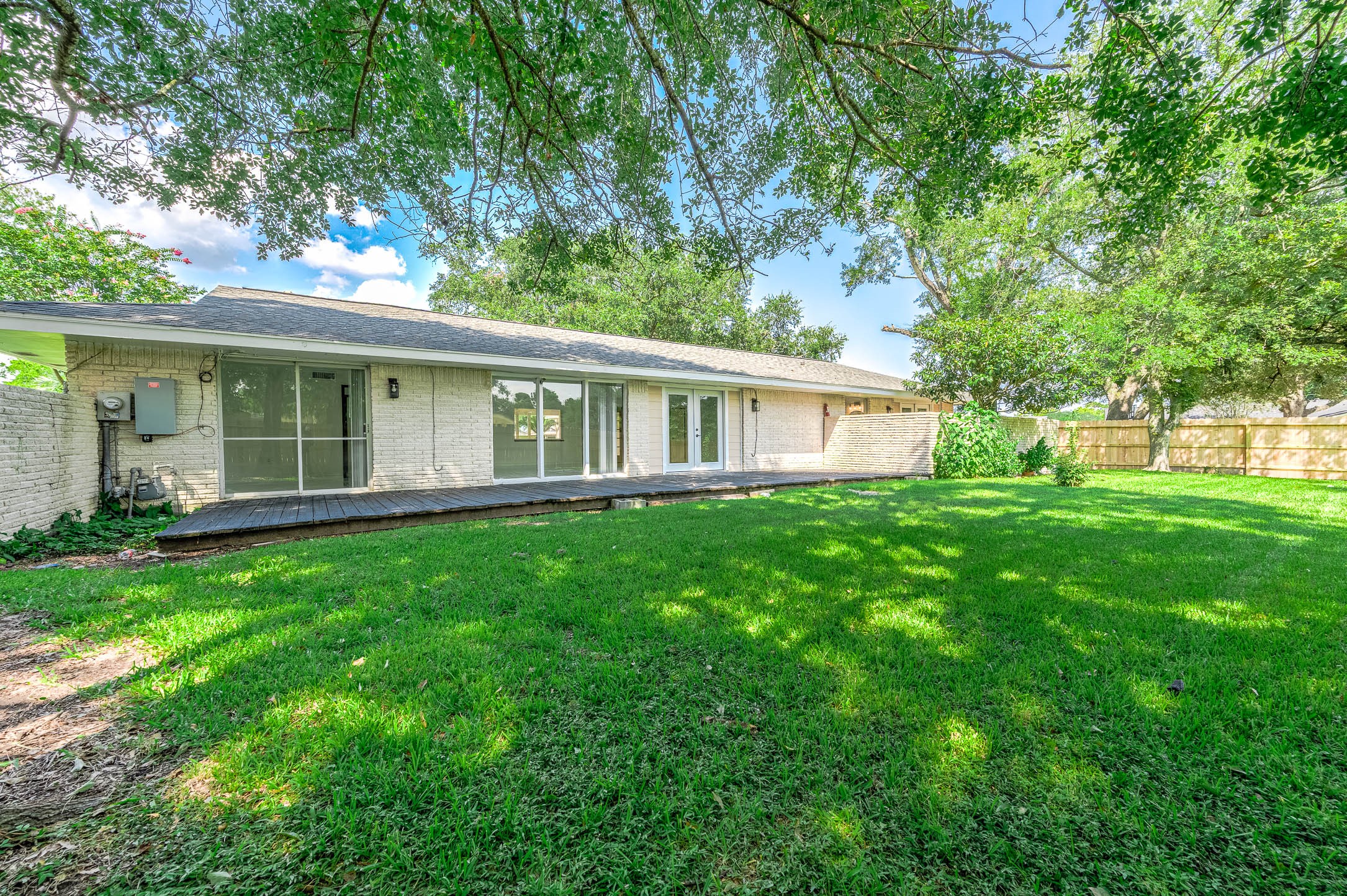 1616 Redway Lane Houston, TX 77062 - Photo 29 of 48 a view of a house with a backyard