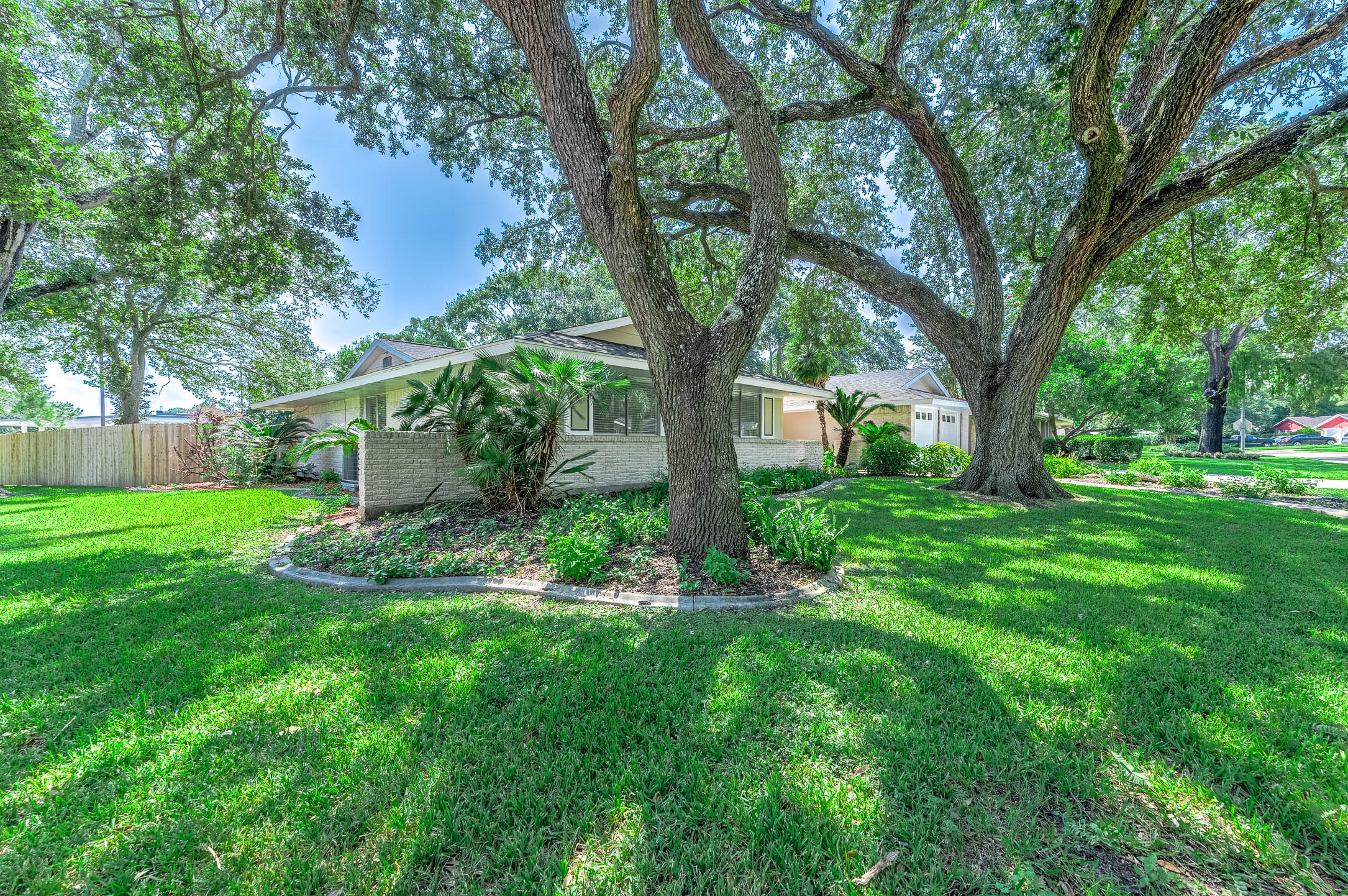 1616 Redway Lane Houston, TX 77062 - Photo 34 of 48 a view of a house with a backyard