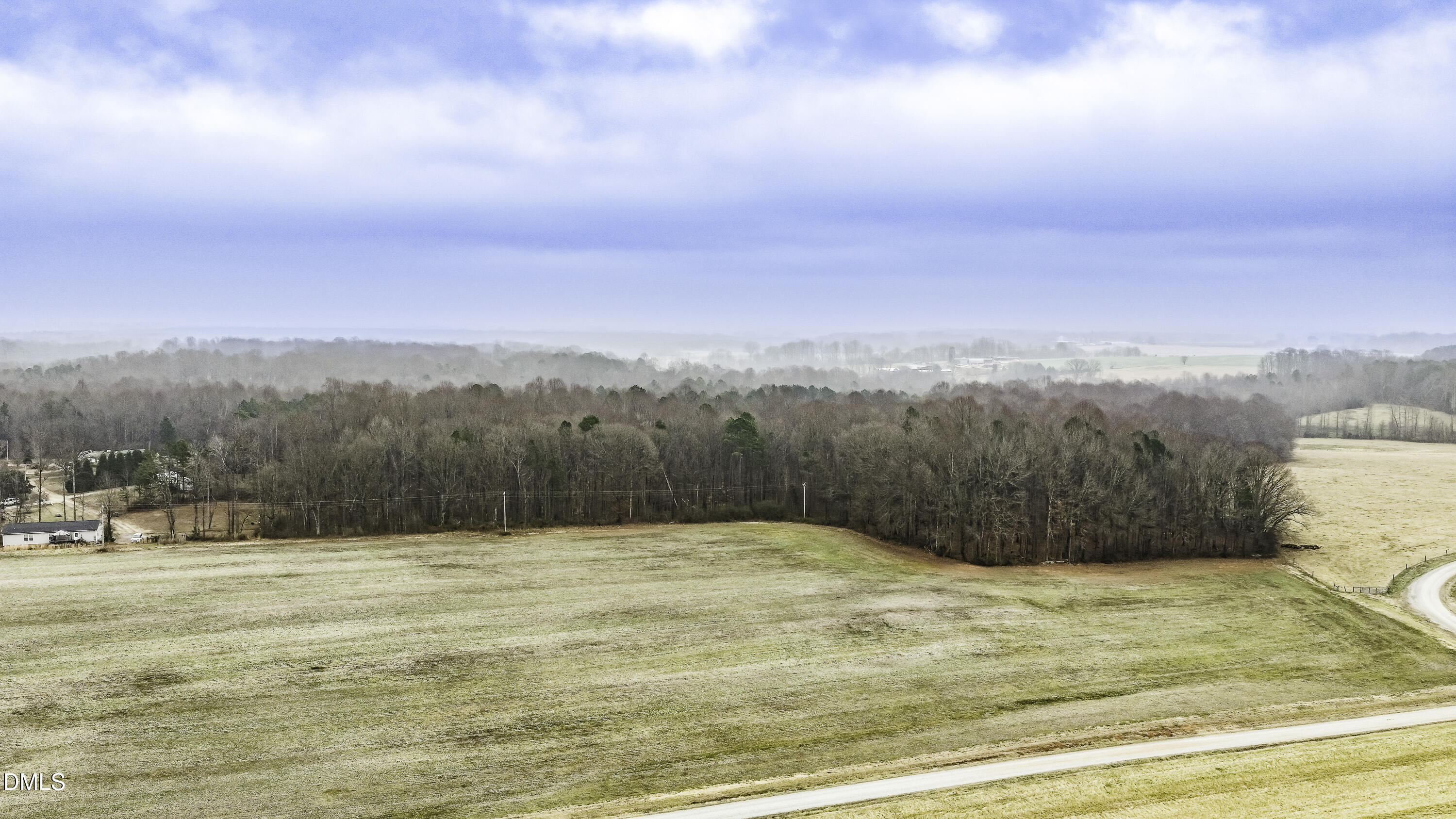 0 Versailles Road Cleveland, NC 27013 - Photo 11 of 33 a view of lake with a mountain in the background