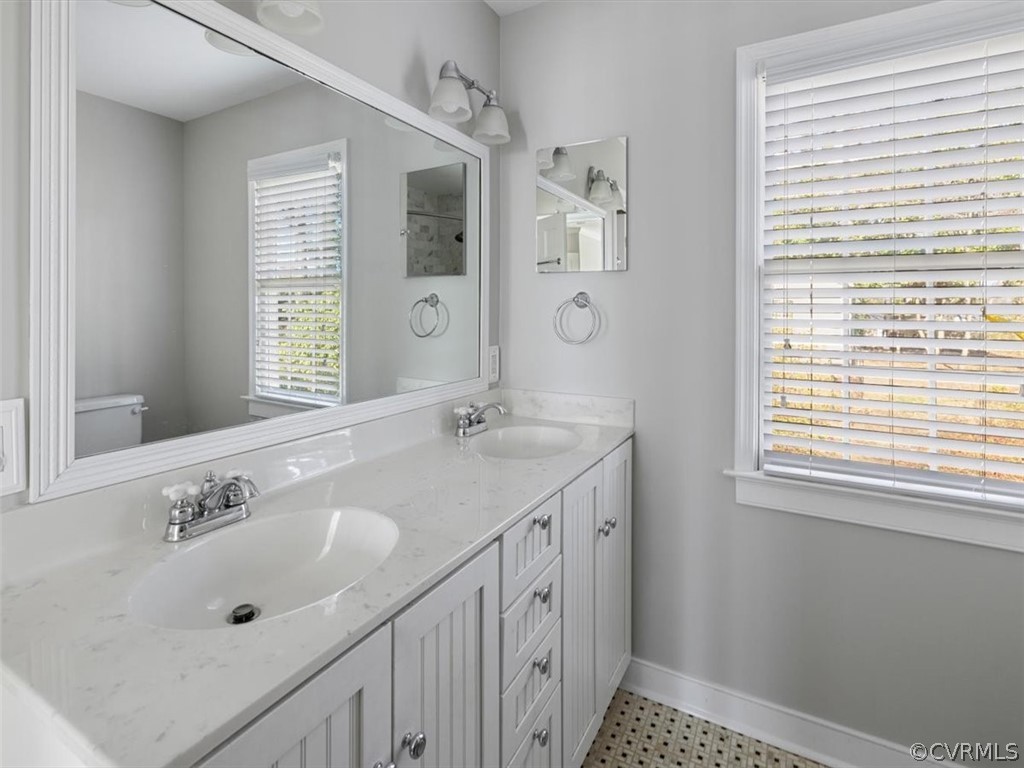 7532 Marilea Road Richmond, VA 23225 - Photo 19 of 37 Double vanity with tub shower.
