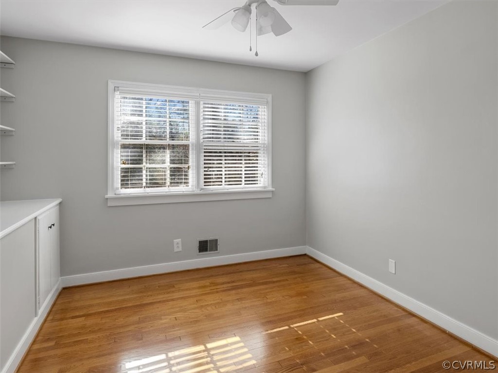 7532 Marilea Road Richmond, VA 23225 - Photo 24 of 37 Bedroom 3. Oak floors and built-ins.