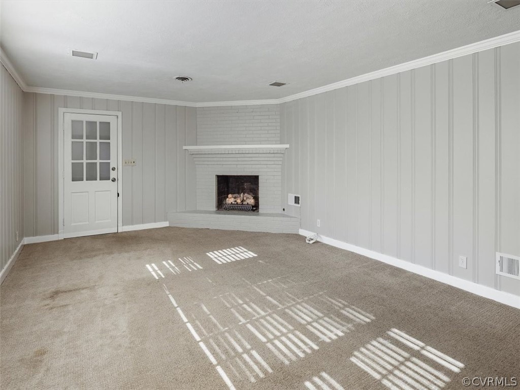 7532 Marilea Road Richmond, VA 23225 - Photo 28 of 37 Gas fireplace with raised brick hearth.